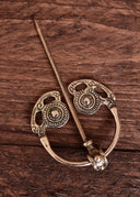 Fibule de Goldsborough, laiton