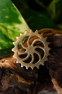 Fibule à disque romaine roue solaire, bronze