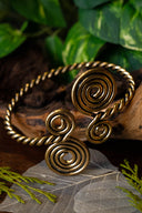 Bracelet de bras celtique avec spirales, bronze