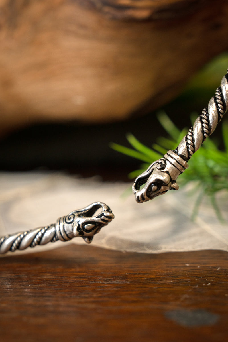 Viking torque with wolf heads, silvered bronze