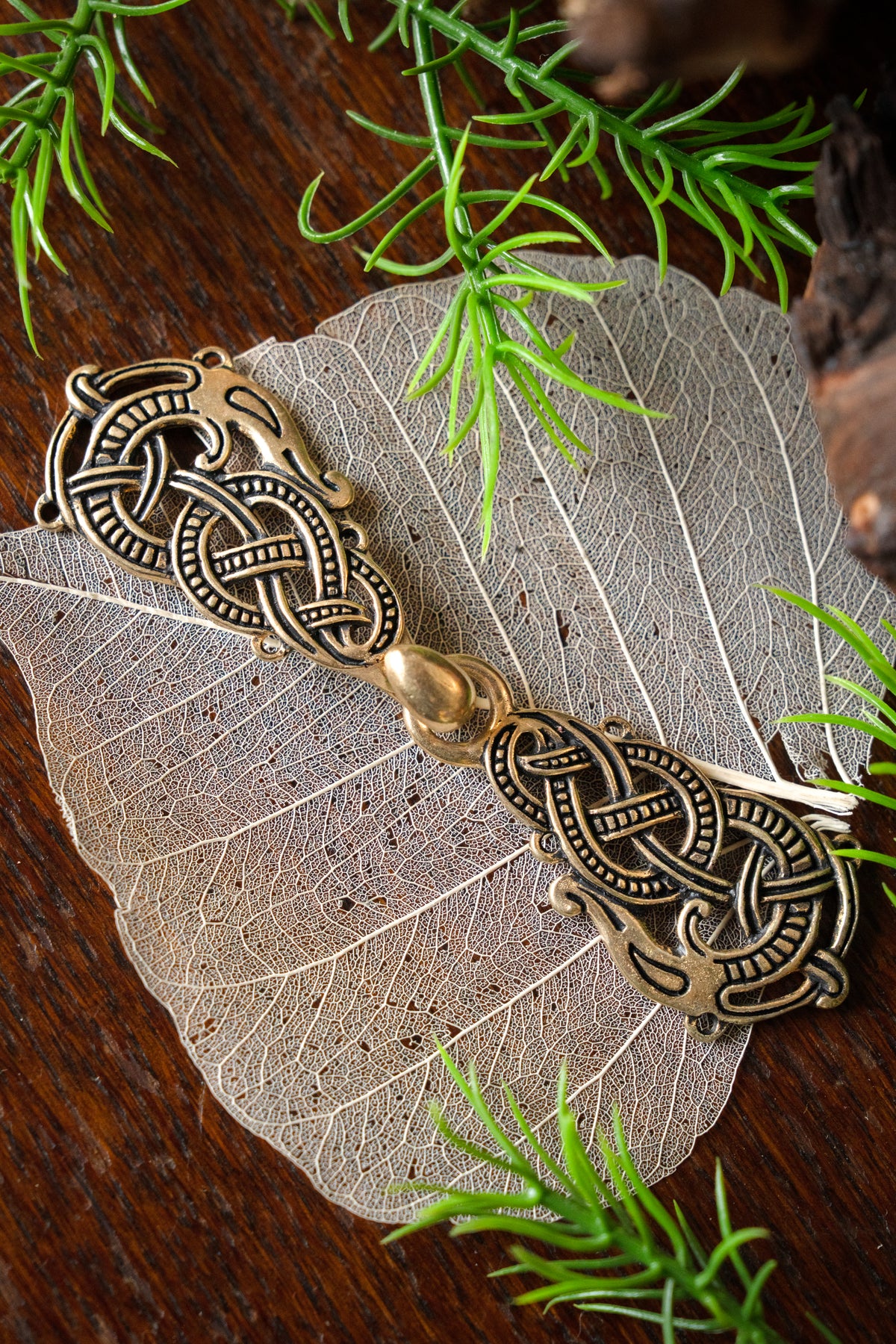 Kappelukning med Midgårdsormen, bronze