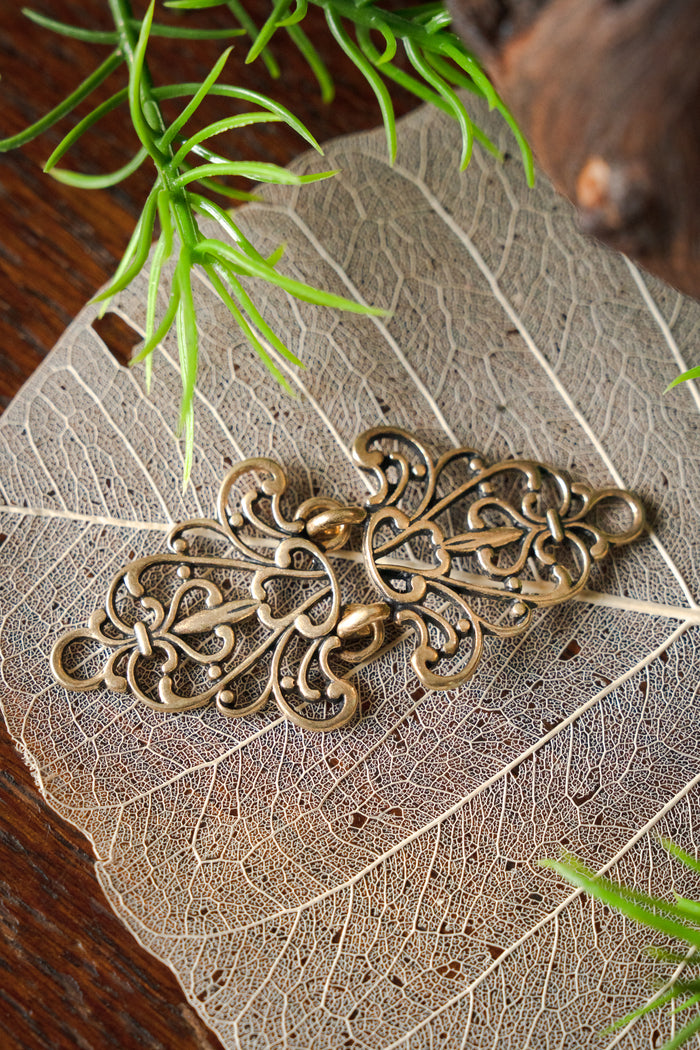 Renässans mantelspänne, brons