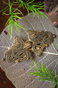 Chiusura per mantello con Serpente di Midgard stile Urnes, bronzo