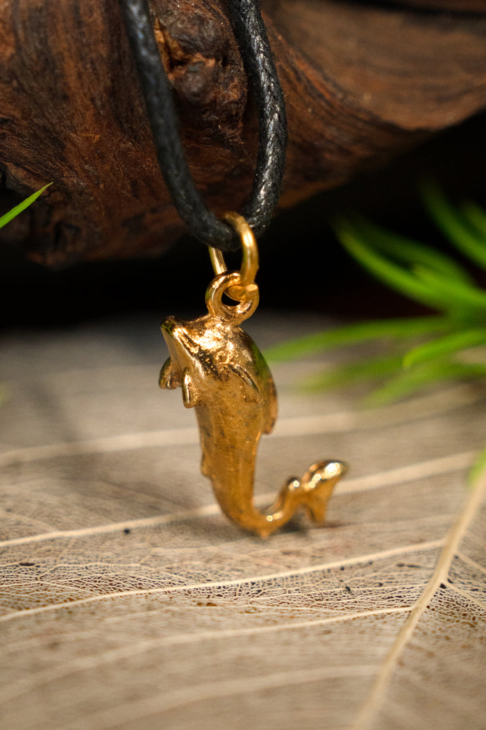 Romeinse dolfijnenhanger, tin