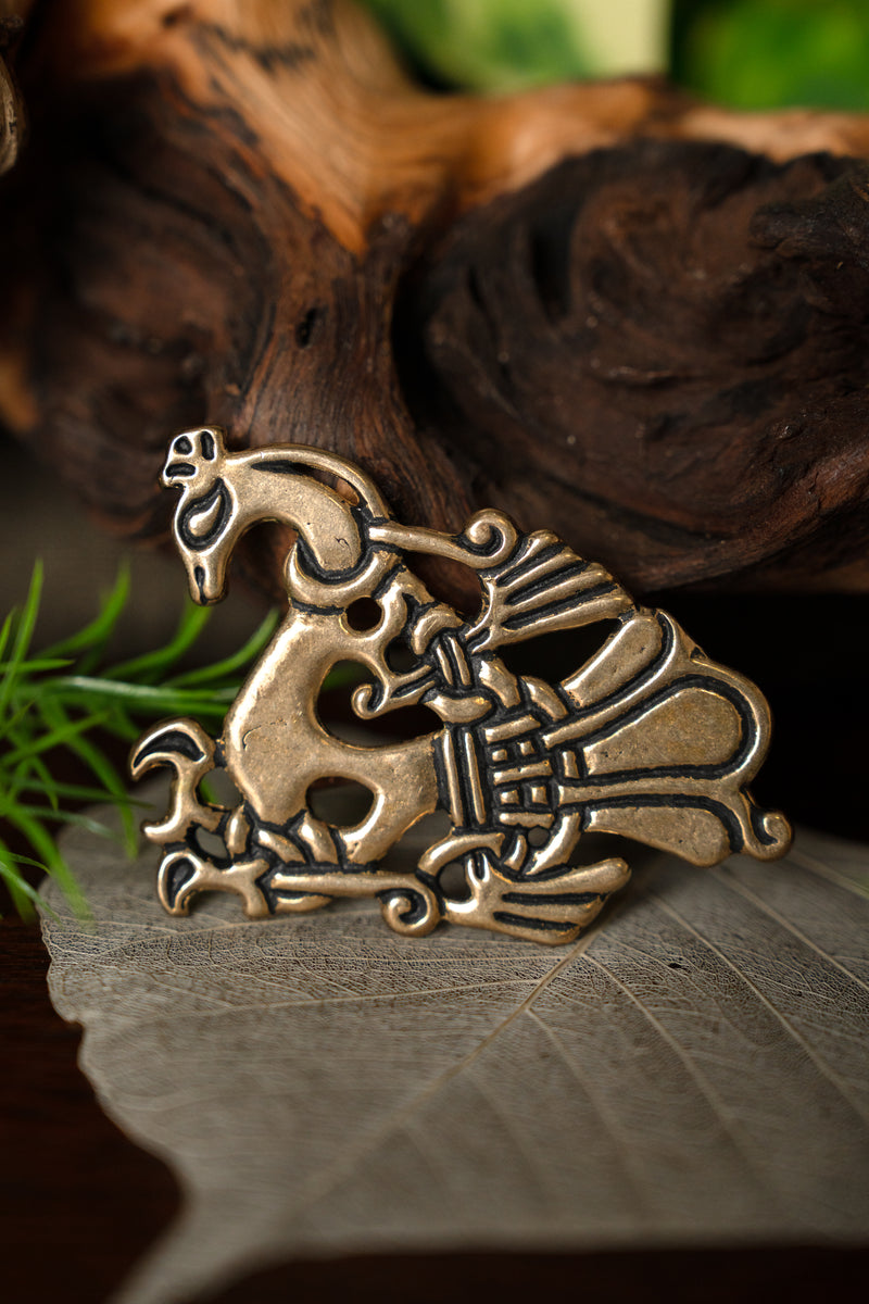 Viking peacock brooch, bronze