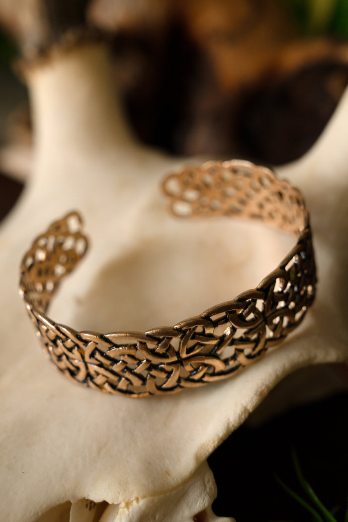 Keltisk armbånd Book of Kells, bronze