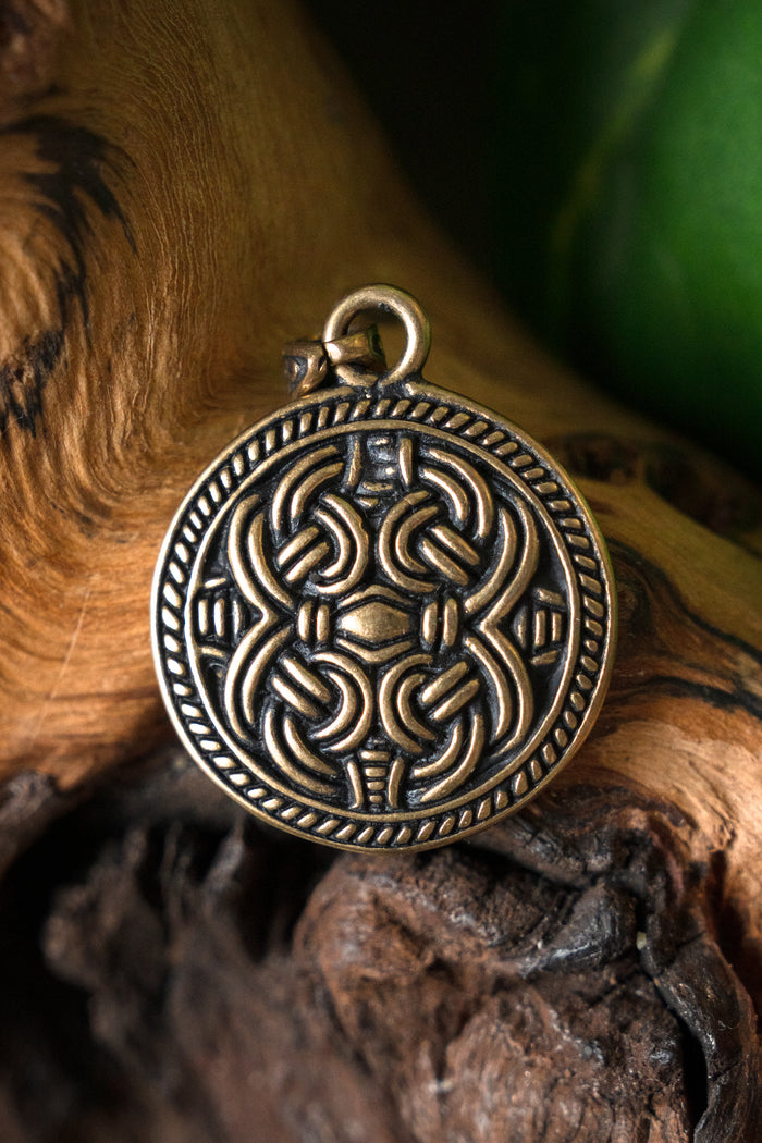 Pendentif disque style Borre, bronze