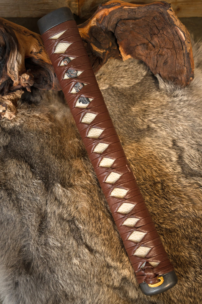Samurai sword grip with leather wrapping