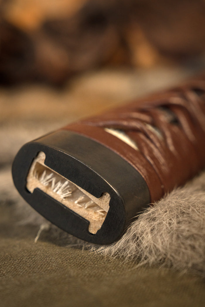 Samurai sword grip with leather wrapping