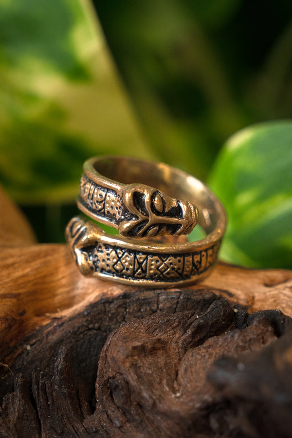 Viking rune ring with wolf heads, bronze