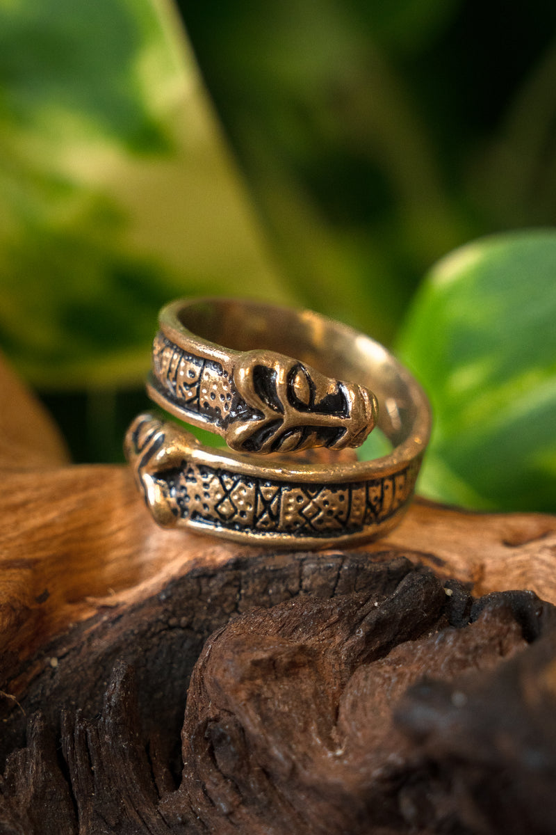 Rung ring with wolf heads, bronze