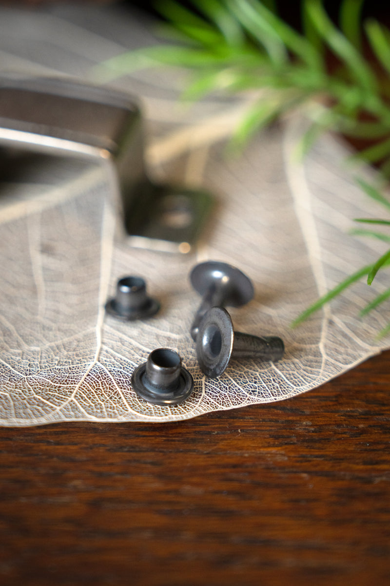 Viking bag strap fitting, silvered