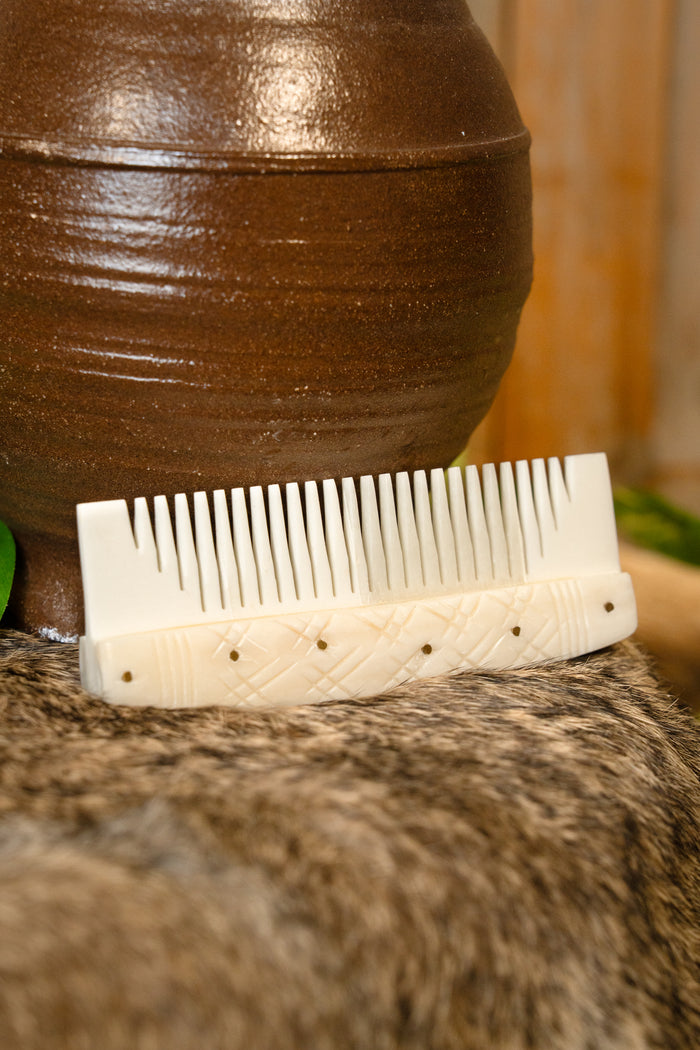 Benen Vikingkam met gestileerde motieven