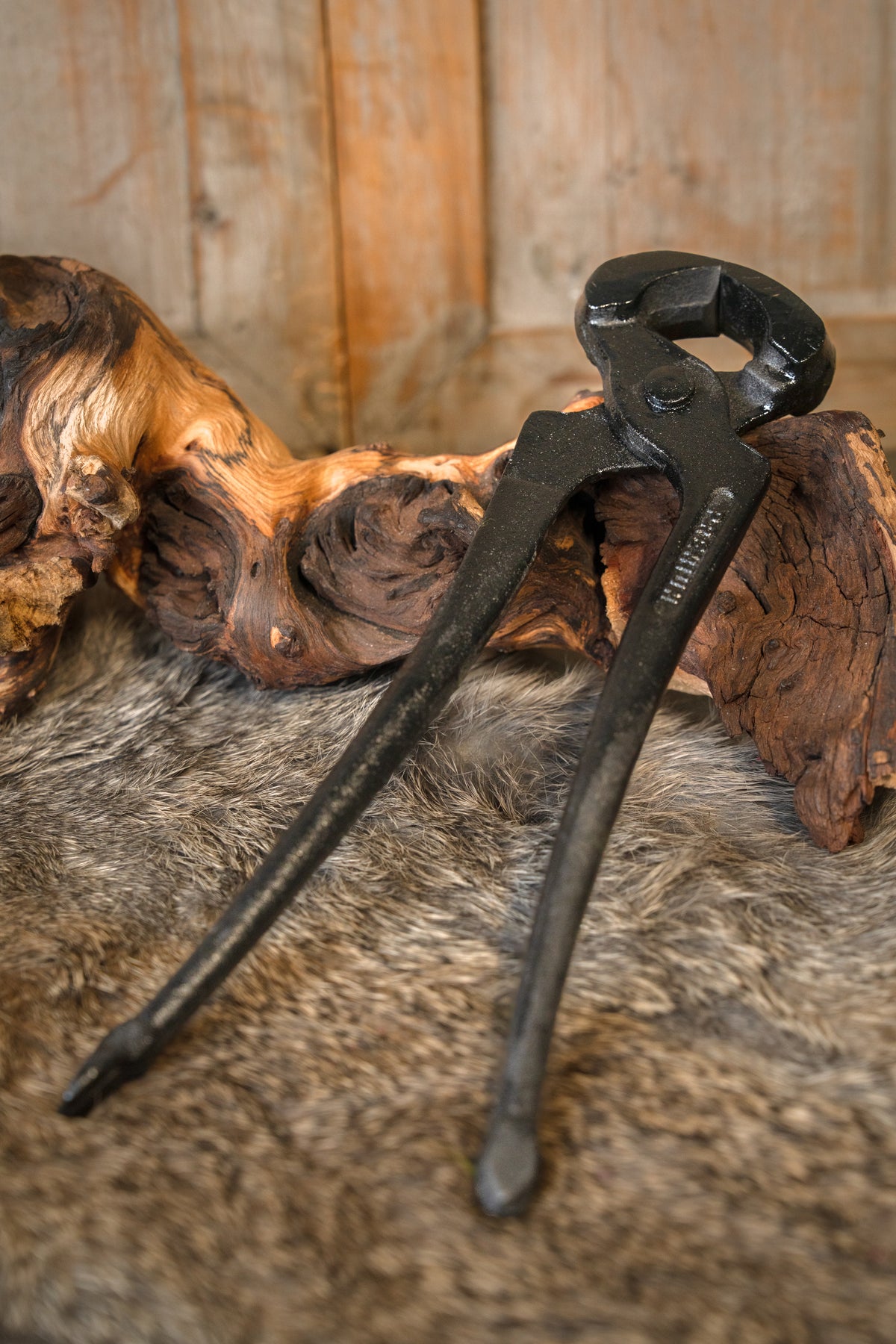 Ringbrynjestång för kilformade nitar