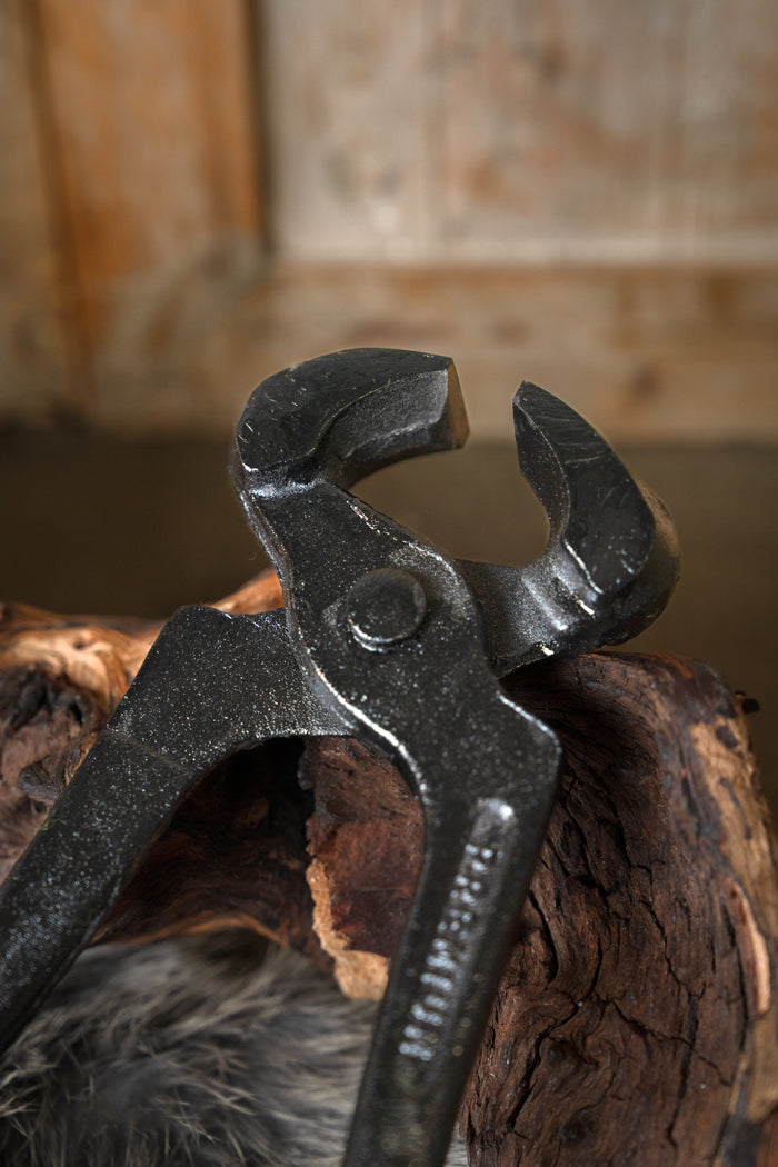 Ringbrynjestång för kilformade nitar