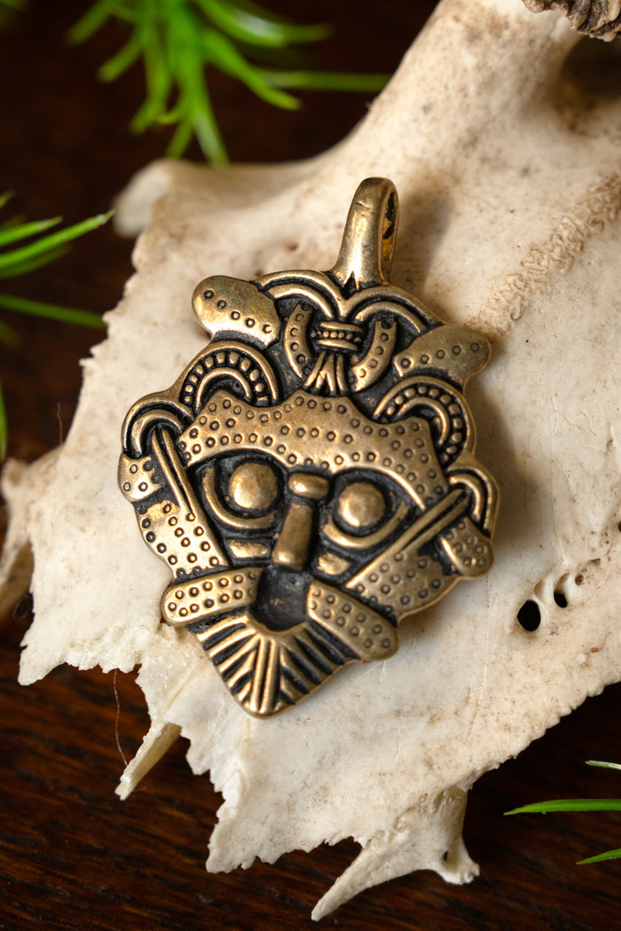 Amulet maski Gniezdowo, brąz