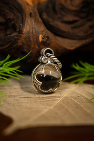 Viking völva mountain crystal amulet Gotland, S, silvered bronze