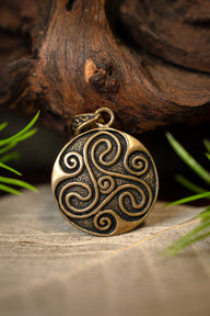 Amulet Celtic trisquelion, bronze