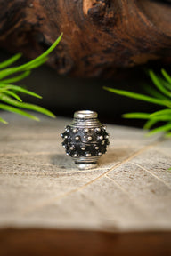 9th-10th century Viking beard bead, silvered bronze