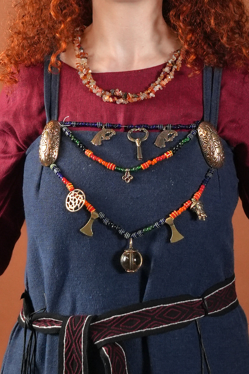 Dysk zdobniczy z triskele, okres Vendel, brąz