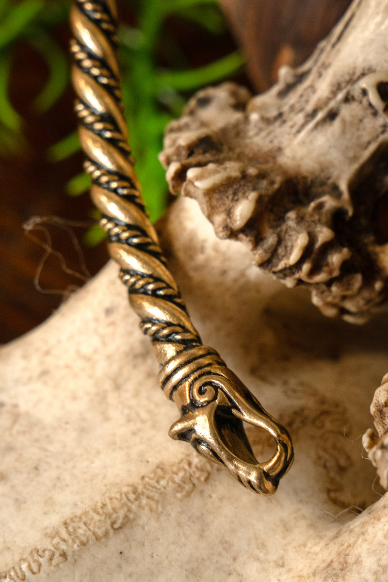 Viking torque with wolf heads, bronze