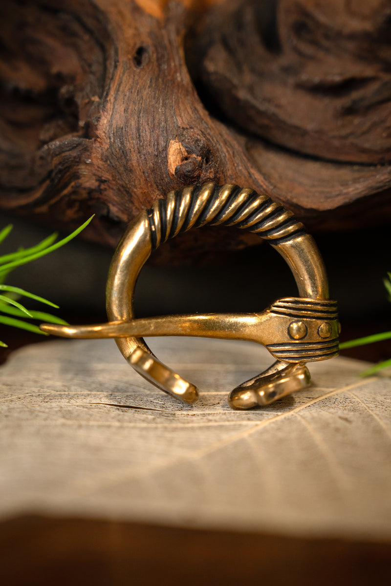 Baltic ring fibula with animal heads, bronze