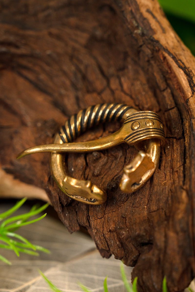 Baltic ring fibula with animal heads, bronze