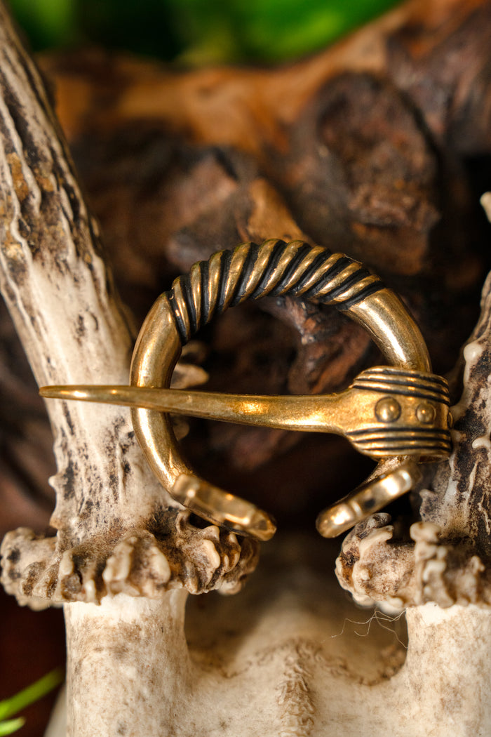 Baltic ring fibula with animal heads, bronze