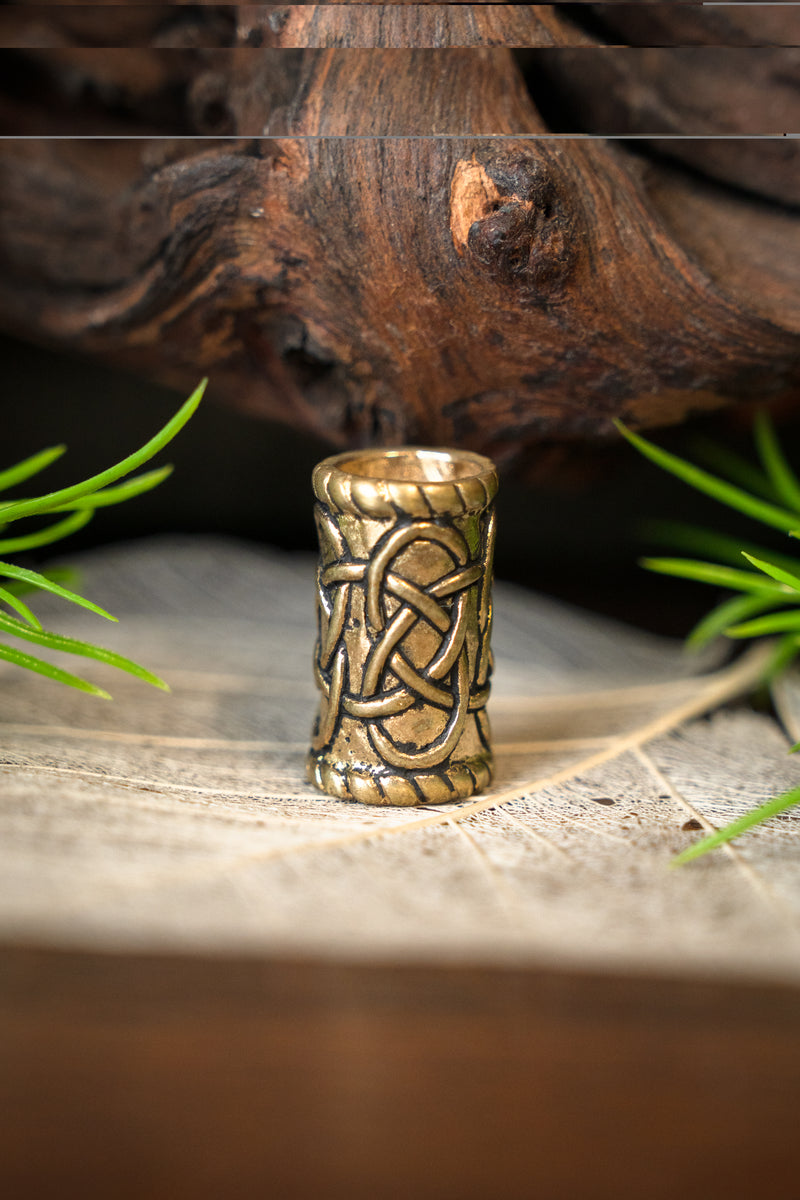 Cylindrisk skäggpärla, brons