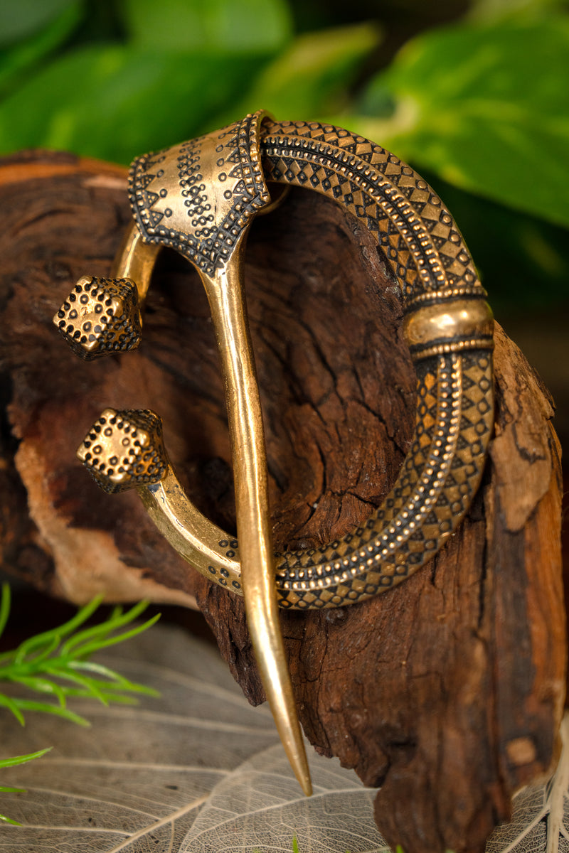 Fíbula de herradura Klintegårda, bronce