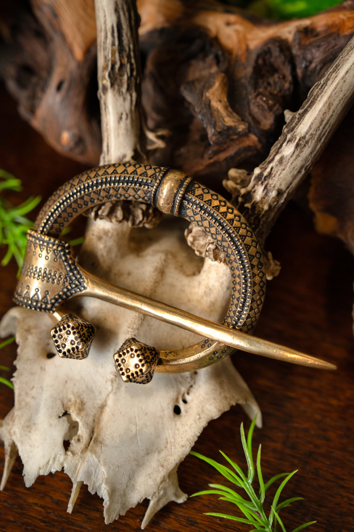 Fibule en fer à cheval Klintegarda, bronze