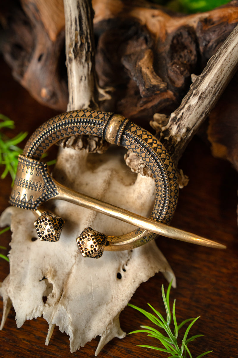 Fíbula de herradura Klintegårda, bronce