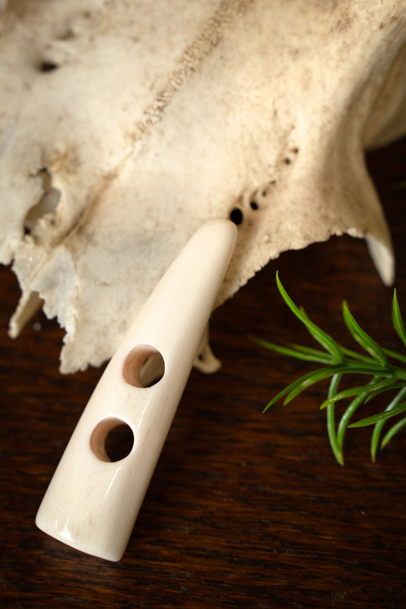 Bone button