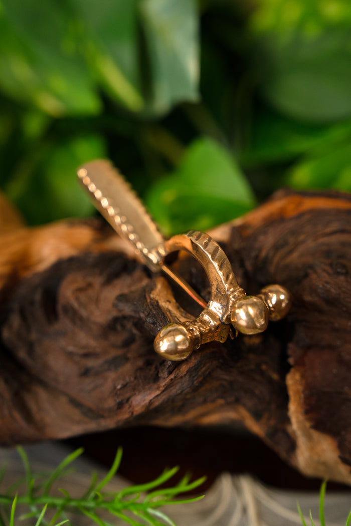 Fibula a balestra romano-germanica, ottone