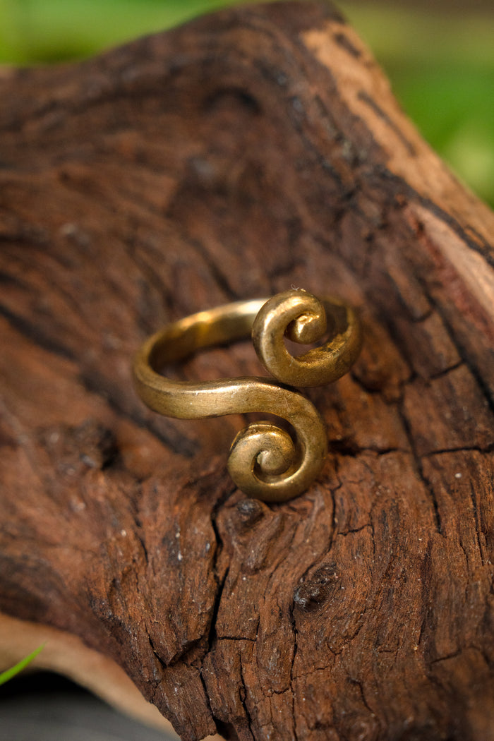 Celtic ring with stylized spiral motif, bronze