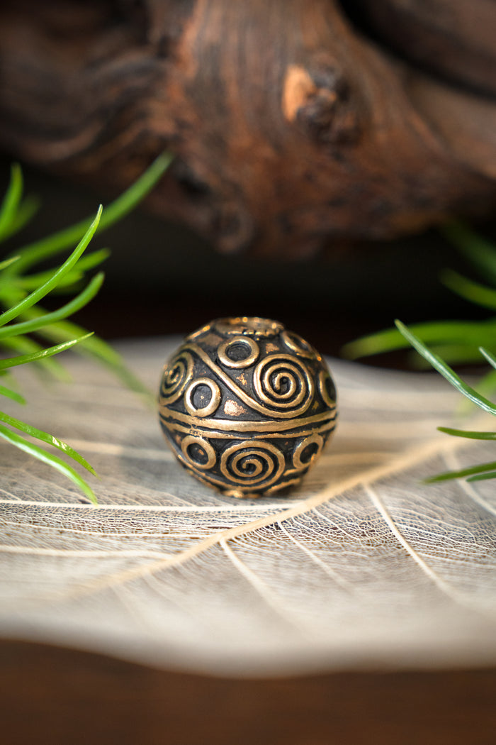 Perle de barbe viking Birka, bronze