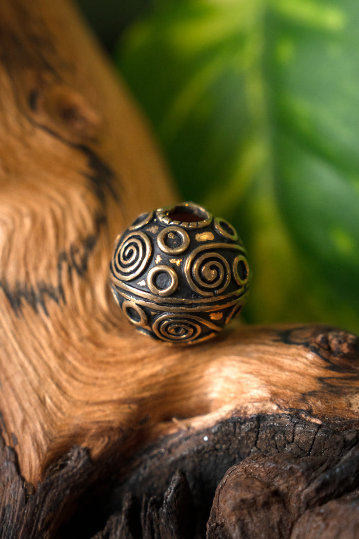 Perle de barbe viking Birka, bronze