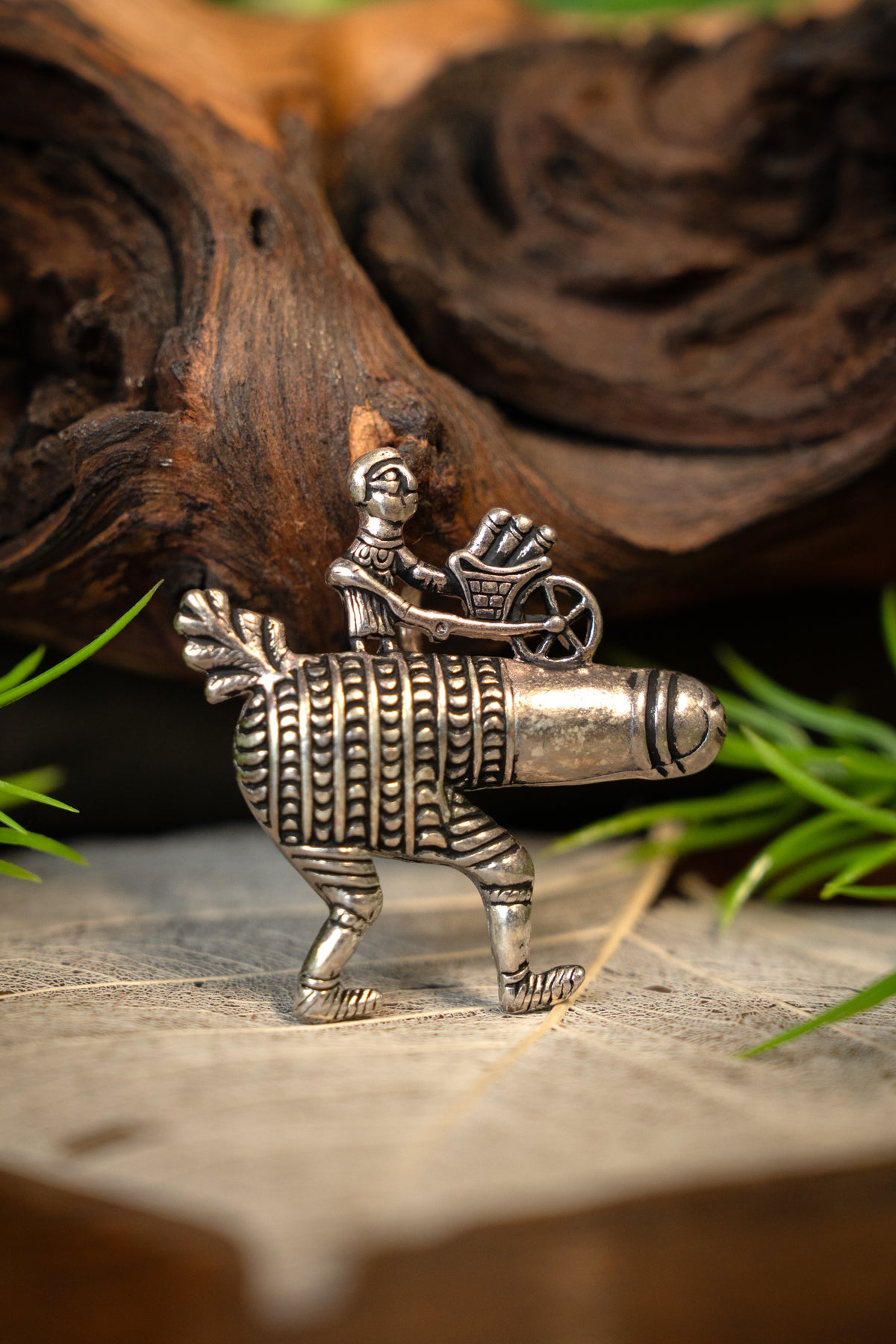 Pilgrim badge phallus with wheelbarrow, silvered bronze