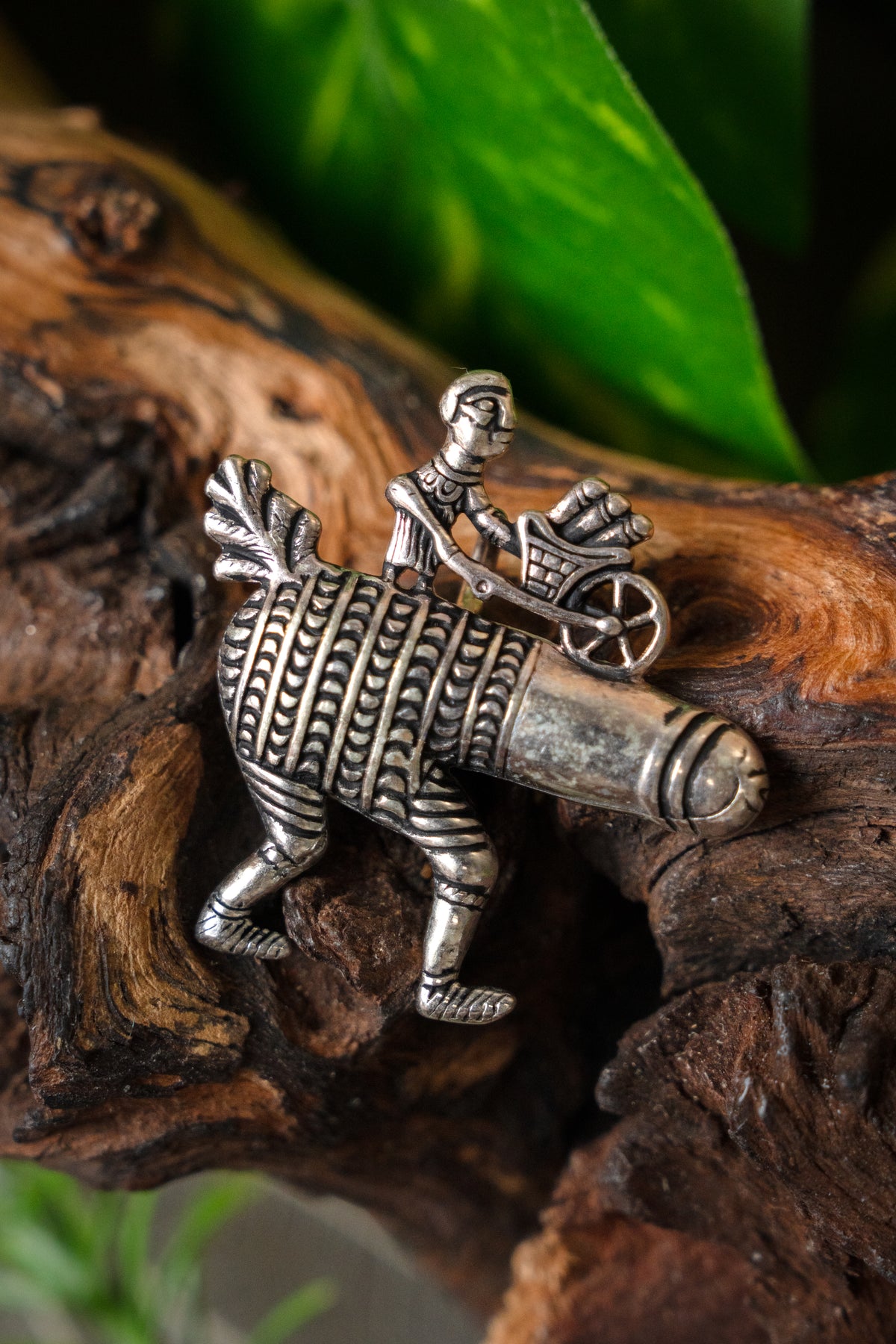 Pilgrim badge phallus with wheelbarrow, silvered bronze