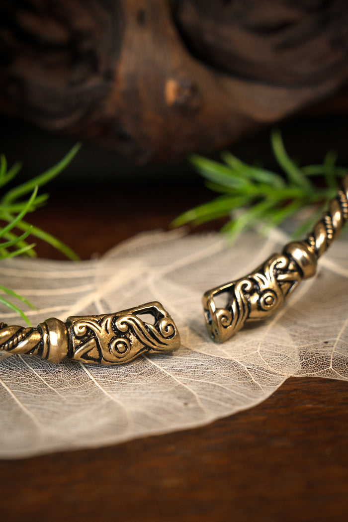 Torques vichingo con teste di drago, bronzo