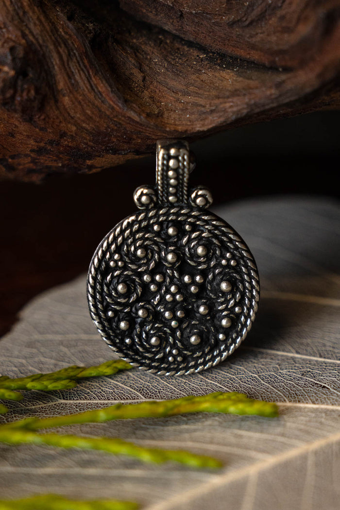 Birka shield amulet, grave 943, silvered bronze