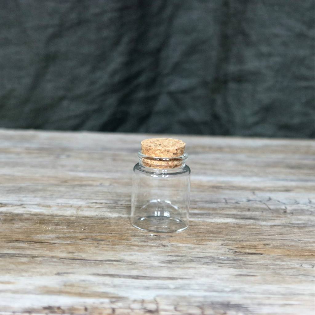 Petit pot rond en verre historique