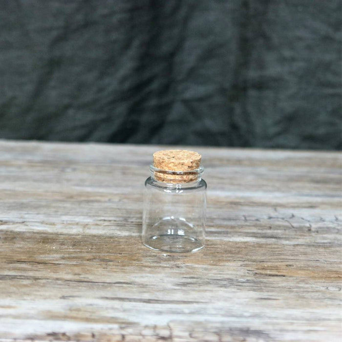 Petit pot rond en verre historique