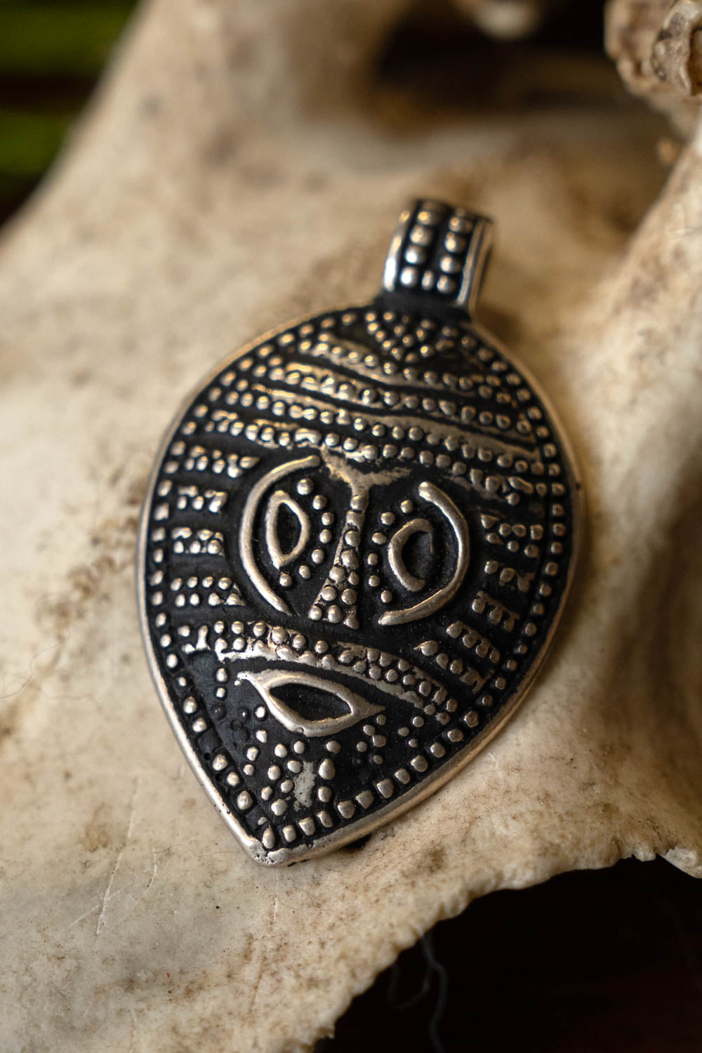 Viking mask amulet Gotland, silvered bronze