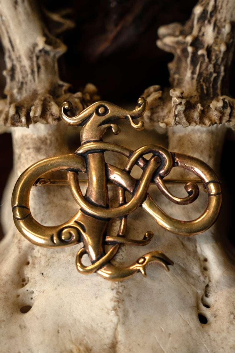 Broche de dragon style Urnes, laiton