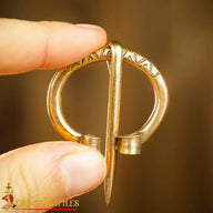 Early medieval horseshoe fibula, brass