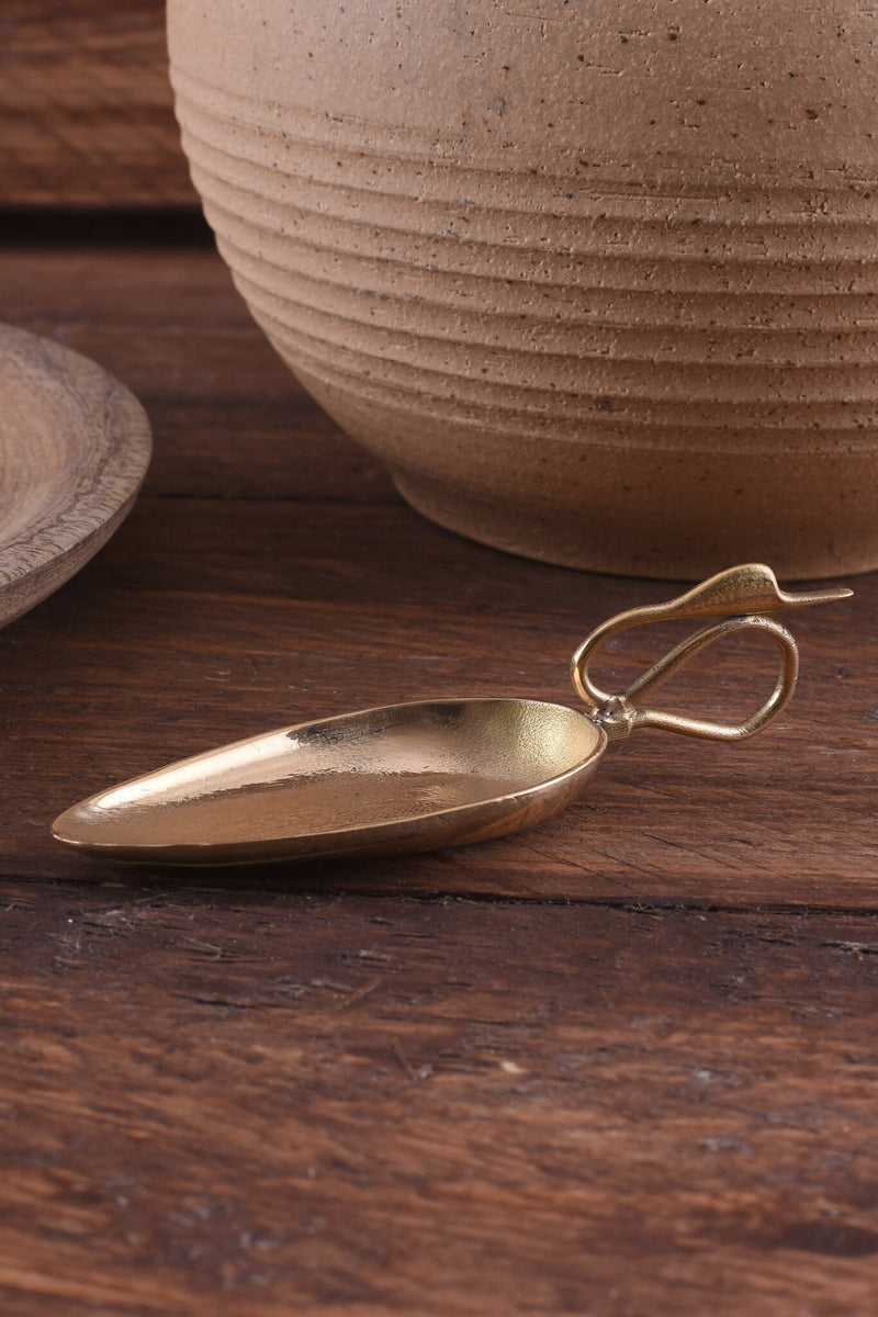 Mässings cignus, romersk sked