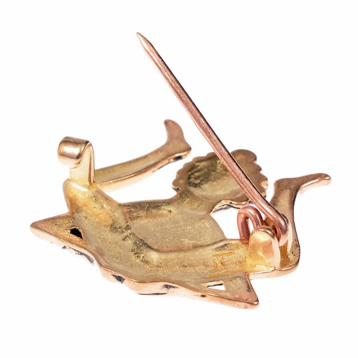 Medieval badge 'ass-showing guy', silvered bronze