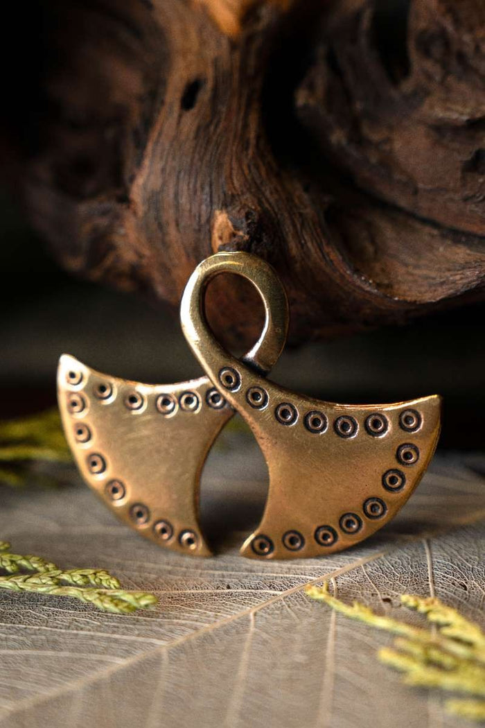 Amulette de l’âge du Bronze Manu et Yemu, en bronze