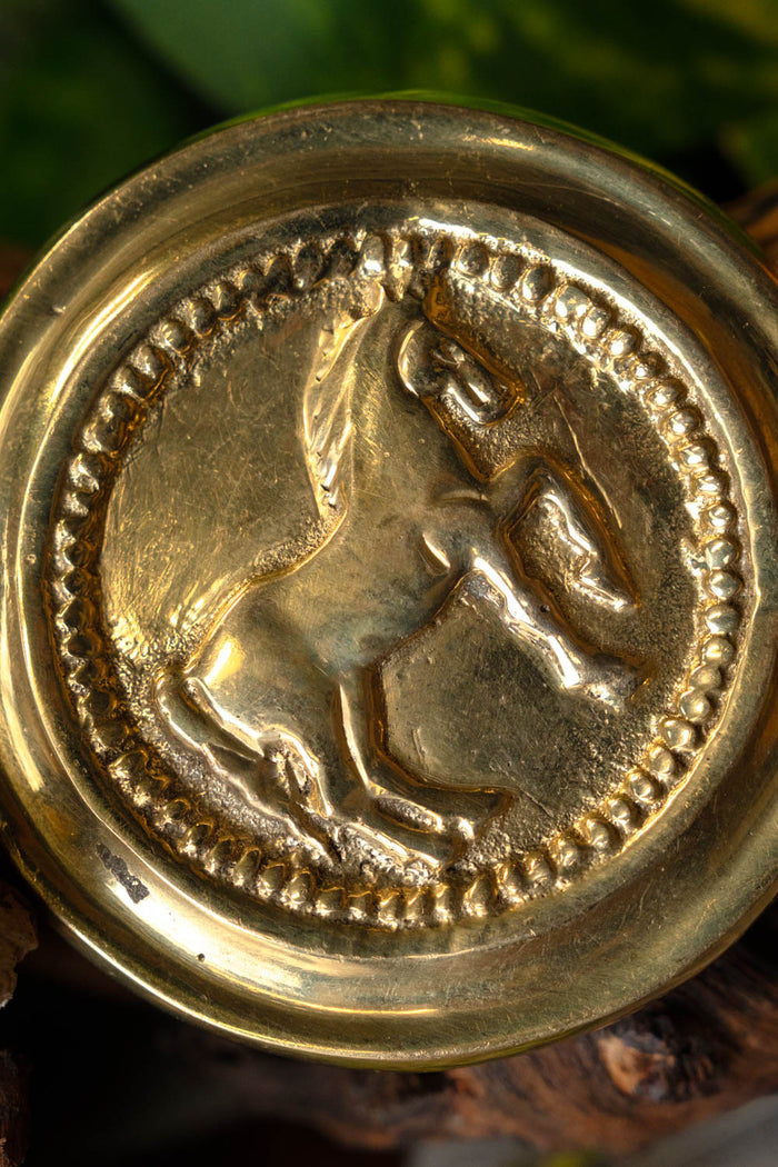 Roman phalera horse gold color